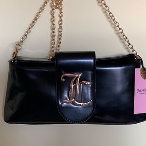 Juicy Couture black patent clutch.